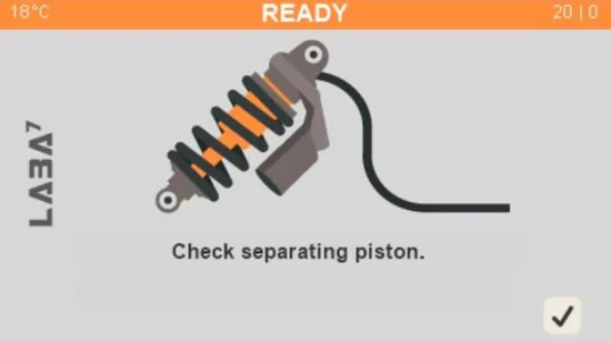 Shock with separating piston getting connected to vacuum pump